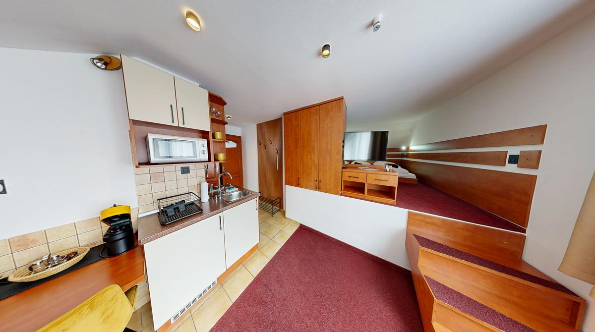 Dvojúrovňový apartmán